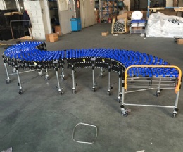 Flexible plastic wheel conveyor